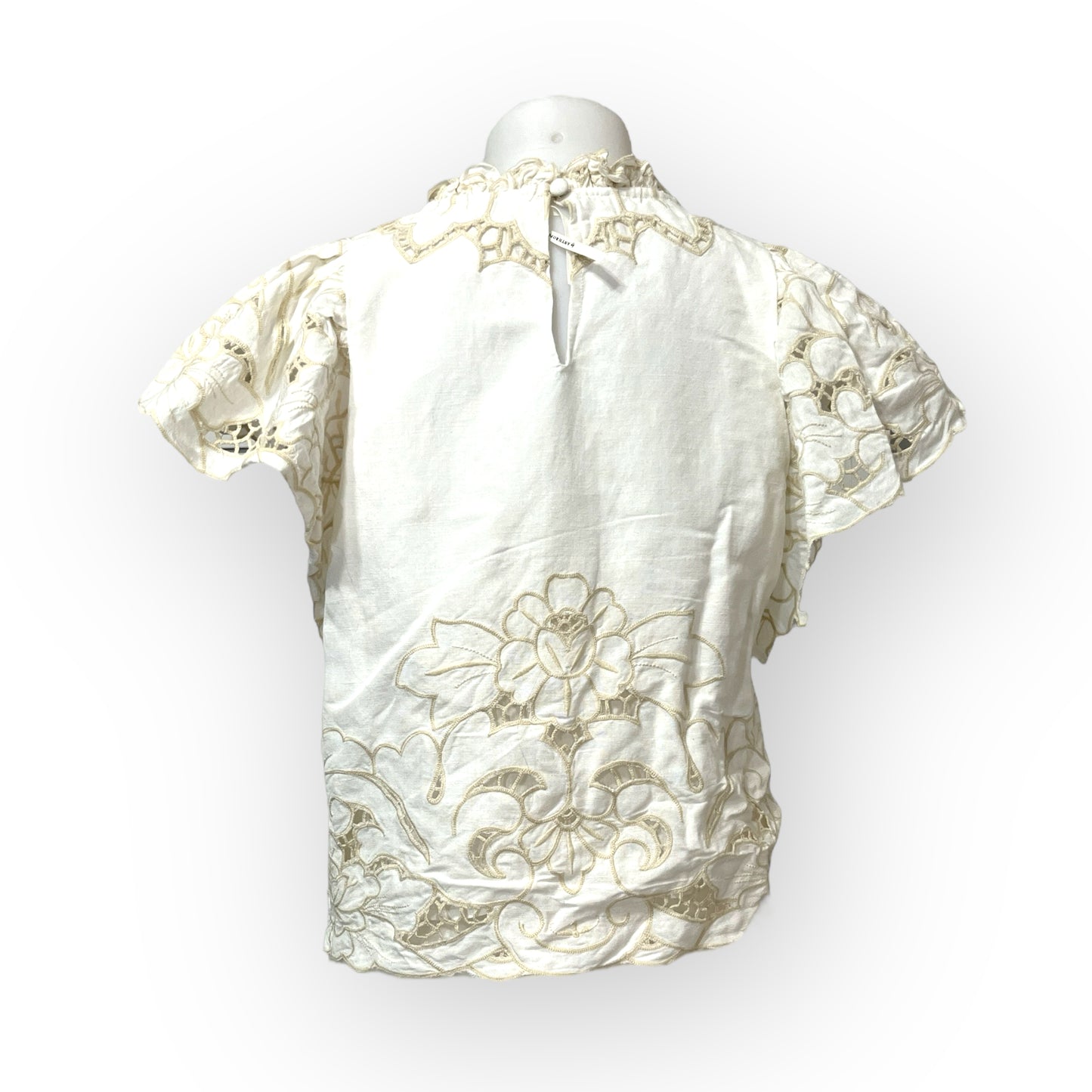 Blusa de Antropología: Elegancia en Blanco con Detalles en Crema